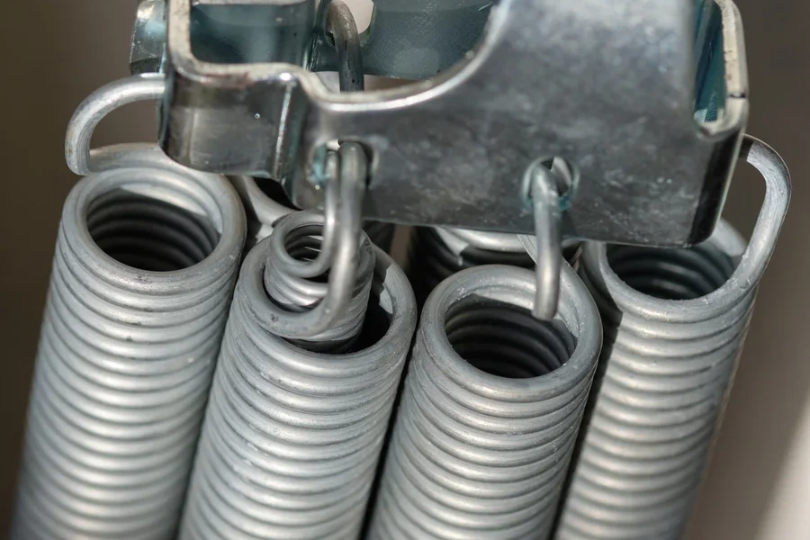 How Garage Door Suppliers Support Spring Repair Services in Houston, TX